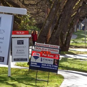 Sold stickers on real estate signs along Beach Drive in the greater Victoria Municipality of Oak Bay, Victoria, BC. (Don Denton/CP)