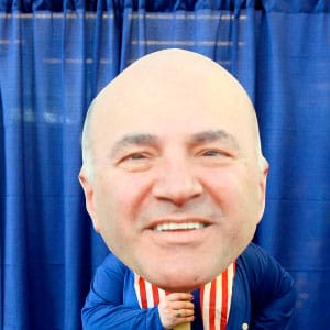 Alison Haley, who supports leadership candidate Lisa Raitt, holds a cutout of leadership candidate Kevin O'Leary before the Conservative leadership debate at the Manning Centre conference, on Friday, Feb. 24, 2017 in Ottawa. (Justin Tang/CP)