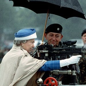 FWC74K HM Queen Elizabeth II fires a rifle during a visit to the Army rifle association at Bisley, England July 1993 (Glenn Harvey/Alamy)