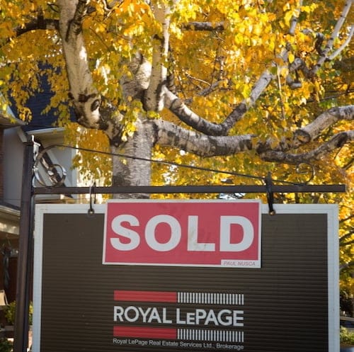 A real estate sold sign hangs in front of a west-end Toronto property Friday, Nov. 4, 2016. THE CANADIAN PRESS/Graeme Roy