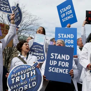Scientists, science advocates and community members gather in Copley Square in Boston on Feb. 19, 2017 for a Rally to Stand up for Science, a call to fight against President Trumps perceived efforts to discredit science and climate research, and to dismantle scientific institutions in the government. (Jessica Rinaldi/The Boston Globe/Getty Images)