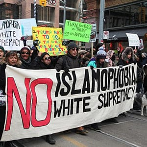 Thousands of Canadians took part in a massive protest against President Trump's travel ban on Muslims during the National Day of Action against Islamophobia and White Supremacy in downtown Toronto, Ontario, Canada, on February 04, 2017. Canadians joined countries around the world in protesting against American President Donald Trump's executive order, banning citizens of seven majority Muslim countries (Iran, Iraq, Sudan, Somalia, Syria, Yemen and Libya) from entering the United States for the next three months and banning Syrian refugees from indefinitely entering America. (Creative Touch Imaging Ltd./NurPhoto/Getty Images)