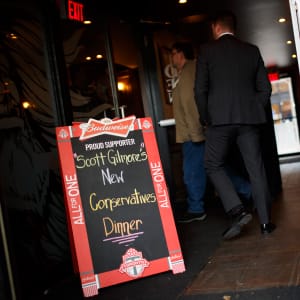 People arrive to Scott Gilmore's New Conservative's Dinner at Brazen Head Pub in Toronto, Ontario on Tuesday, April 25, 2017. (Photo by Cole Burston)