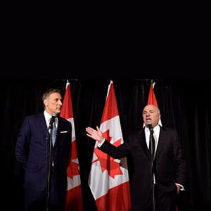 Conservative Party leadership candiidate Maxime Bernier (left) looks on as Kevin O'Leary addresses a news conference in Toronto, Wednesday, April 26, 2017, after it was announced that O'Leary had quit the leadership race and thrown his support behind Bernier. (Nathan Denette/CP)