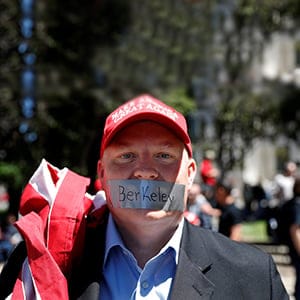 A man looks on as opposing factions gather over the cancelation of conservative commentator Ann Coulter's speech at the University of California, Berkeley, in Berkeley, California, U.S., April 27, 2017. (Stephen Lam/Reuters)