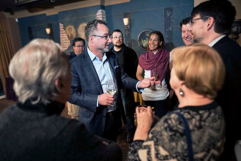 Scott Gilmore leads a discussion before dinner at Cafe Chianti in Halifax, N.S. on Monday, April 24, 2017. (Photograph by Darren Calabrese)
