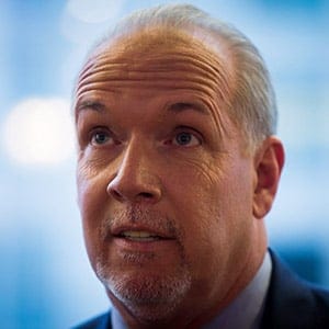 B.C. NDP Leader John Horgan watches election results on television at a hotel after the provincial election polls closed, in Vancouver, B.C., on Tuesday May 9, 2017. THE CANADIAN PRESS/Darryl Dyck