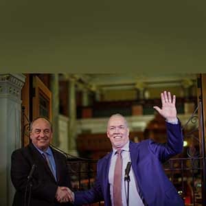 B.C. Green party leader Andrew Weaver and B.C. NDP leader John Horgan speak to media after announcing they'll be working together to help form a minority government during a press conference at Legislature in Victoria, B.C., on Monday, May 29, 2017. (Chad Hipolito/CP)