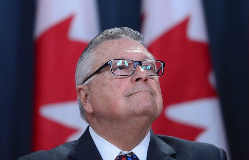 Ralph Goodale, Minister of Public Safety and Emergency Preparedness makea a national security-related announcement at the National Press Theatre in Ottawa on Tuesday, June 20, 2017. THE CANADIAN PRESS/Sean Kilpatrick