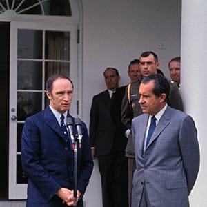 Canadian Prime Minister Pierre Elliot Trudeau speaks outside the White House, 3/25, after concluding talks with President Nixon, right. Trudeau was the first world leader to be officially received at the White House since the new administration took office. (Bettmann/Getty)