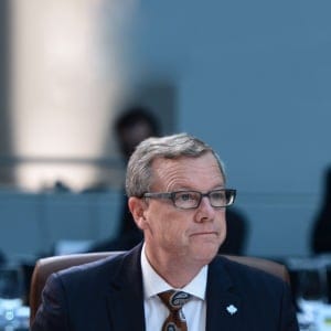 Saskatchewan Premier Brad Wall gets settled in for the Meeting of First Ministers in Ottawa on Friday, Dec. 9, 2016. (Sean Kilpatrick/CP)