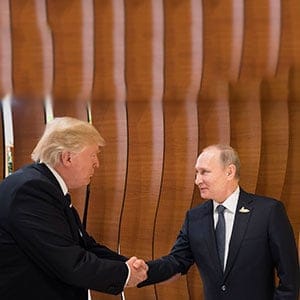 HAMBURG, GERMANY - JULY 07: In this photo provided by the German Government Press Office (BPA) Donald Trump, President of the USA (left), meets Vladimir Putin, President of Russia (right), at the opening of the G20 summit on July 7, 2017 in Hamburg, Germany. The G20 group of nations are meeting July 7-8 and major topics will include climate change and migration. (Steffen Kugler/BPA/Getty Images)