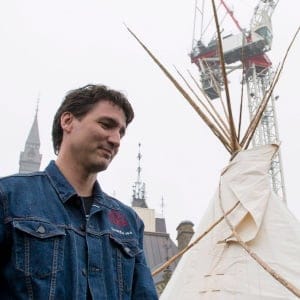 Prime Minister Justin Trudeau leaves a teepee on Parliament Hill in Ottawa on Friday, June 30, 2017. (Justin Tang/CP)