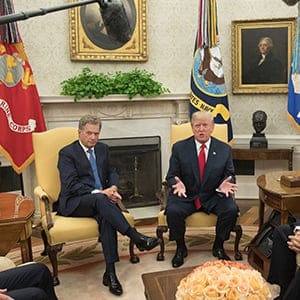 WASHINGTON, DC - AUGUST 28: US President Donald J. Trump (C) delivers remarks to members of the news media during his meeting with President Sauli Niinisto (L) of Finland, US Secretary of State Rex Tillerson (R) and US Vice President Mike Pence (2-R) in the Oval Office of the White House on August 28, 2017 in Washington, D.C. (Photo by Michael Reynolds-Pool/Getty Images)