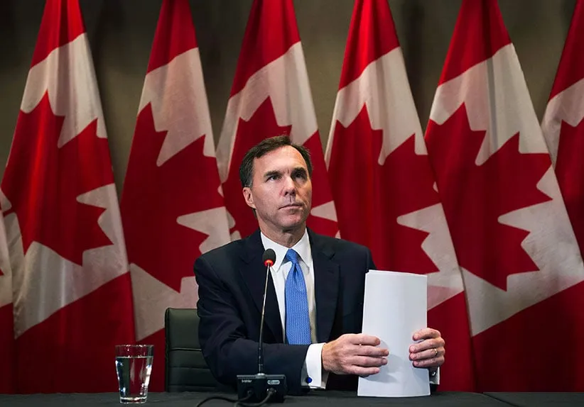 Finance Minister Bill Morneau makes an announcement on housing in Toronto Monday, October 3, 2016. The federal government has announced measures intended to stabilize the real estate sector amid concerns that pockets of risk have emerged in some housing markets, particularly those in Toronto and Vancouver. (Nathan Denette/CP)