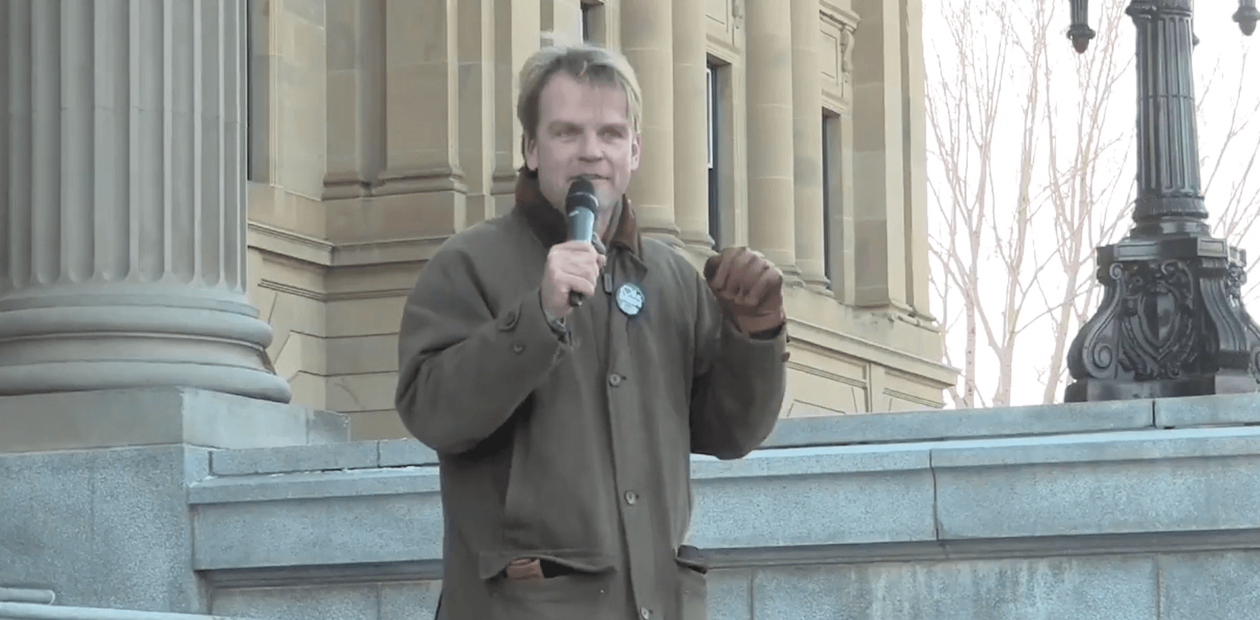 Chris Alexander, on the steps of the Alberta legislature for a Rally for Alberta held by Rebel Media. (Screen capture)