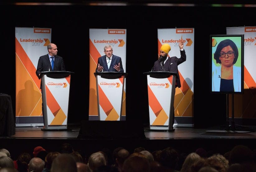 Guy Caron, from left to right, Charlie Angus, Jagmeet Singh and Niki Ashton, via satellite from Ottawa, participate in the final federal NDP leadership debate in Vancouver, B.C., on Friday September 1, 2017. Candidate Niki Ashton participated via satellite from Ottawa. Online voting begins September 18 with results announcement events being held after each round of balloting until a new leader is elected. The first announcement will take place on October 1 and if no candidate receives a majority an additional two rounds could follow. THE CANADIAN PRESS/Darryl Dyck