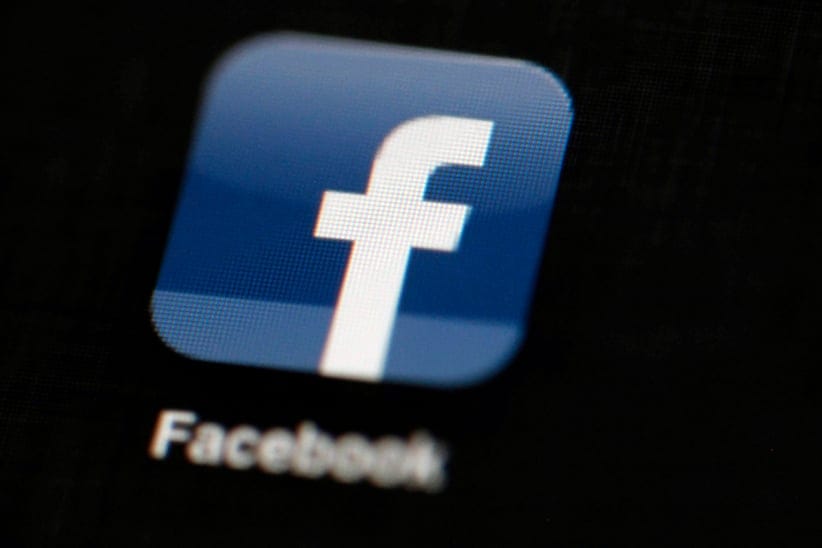 FILE - In this May 16, 2012 file photo, the Facebook logo is displayed on an iPad in Philadelphia. Facebook is adding more Snapchat-like features to its app. The company says it wants to let people's cameras "do the talking" as more people are posting photos and videos instead of blocks of text. With the update coming to users starting Tuesday, March 28, 2017, Facebook is adding a camera icon to the top left corner of its mobile app.. (Matt Rourke/AP)