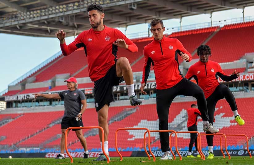 Players on Canada's men's national soccer train before a friendly against Jamaica at BMO Field in Toronto in September 2017