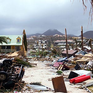 A photo taken on September 7, 2017 shows damage in Orient Bay on the French Carribean island of Saint-Martin, after the passage of Hurricane Irma.
France, the Netherlands and Britain on September 7 rushed to provide water, emergency rations and rescue teams to territories in the Caribbean hit by Hurricane Irma, with aid efforts complicated by damage to local airports and harbours. The worst-affected island so far is Saint Martin, which is divided between the Netherlands and France, where French Prime Minister Edouard Philippe confirmed four people were killed and 50 more injured. (Lionel Chamoiseau/AFP/Getty Images)