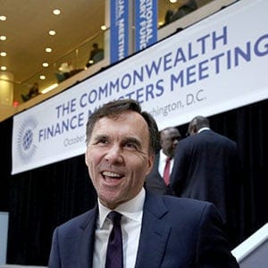 Canadian finance minister Bill Morneau (C) reacts after The Commonwealth Finance Ministers meeting family photo during the IMF/World Bank annual meetings in Washington, U.S., October 12, 2017. (Yuri Gripas/Reuters)