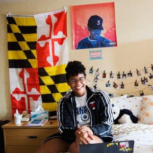 American teenager Rebekah Robinson who has studied in Russia and France, speaks both languages and is currently studying at the University of Toronto, poses for a photo in her dorm room backdropped by her home state flag of Maryland in Toronto on September 20, 2017. (Photograph by Michelle Siu)