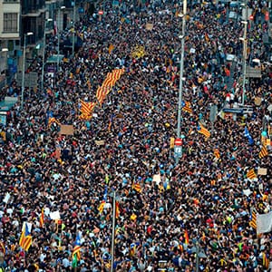 Protesters demonstrate at the Placa de la Universitat square in Barcelona during a general strike in Catalonia called by Catalan unions on October 3, 2017.
Large numbers of Catalans observe a general strike today to condemn police violence at a banned weekend referendum on independence, as Madrid comes under growing international pressure to resolve its worst political crisis in decades. (Josep Lago/AFP/Getty Images)