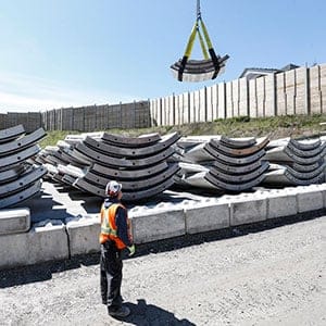Segments are lifted by crane from ground level onto a rail system that will move them into the tunnel at the Eglinton Crosstown east launch site. (Bernard Weil/Toronto Star/Getty Images)