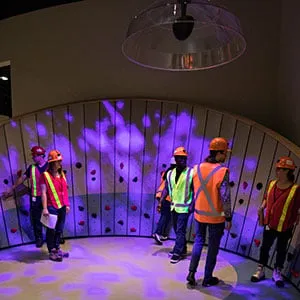 Museum tour guides get their first look at the the ZOOOM - Children's Innovation Zone at the newly renovated Museum of Science and Technology in Ottawa October 25, 2017. Photograph by Blair Gable
An 8,000 sq. ft. space for children two to eight years of age, this gallery is composed of nine circle-themed modules providing opportunities for play and experimentation. At its heart is the spirit of innovation that drives discovery. The gallery will feature elements of surprise and experimentation including a designated toddler area in close proximity to a family room, an interactive gear wall, a building station with over-sized foam blocks, a multi-sensorial play structure where children can run, a vehicle building station and test ramp, a light and sound console, and wind vortex with a large circular path and animated features.