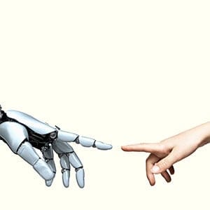Cybernetic robot hand and child's hand point toward each other. (Coneyl Jay/Getty Images)
