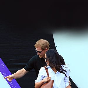 Prince Harry (L) and Meghan Markle (R) attend a Wheelchair Tennis match during the Invictus Games 2017 at Nathan Philips Square on September 25, 2017 in Toronto, Canada. (Vaughn Ridley/Getty Images)