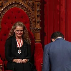 Canadian Prime Minister Justin Trudeau bowes to the new the Governor general Julie Payette at the senate in Ottawa, Ontario, October 2, 2017.
The former astronaut Julie Payette is the 29th Governor General of Canada. / AFP PHOTO / Lars Hagberg (Photo credit should read LARS HAGBERG/AFP/Getty Images)
