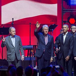 (L-R) Former US Presidents, Jimmy Carter, George H. W. Bush, George W. Bush, Bill Clinton and Barack Obama attend the Hurricane Relief concert in College Station, Texas, on October 21, 2017. / AFP PHOTO / JIM CHAPIN (Photo credit should read JIM CHAPIN/AFP/Getty Images)