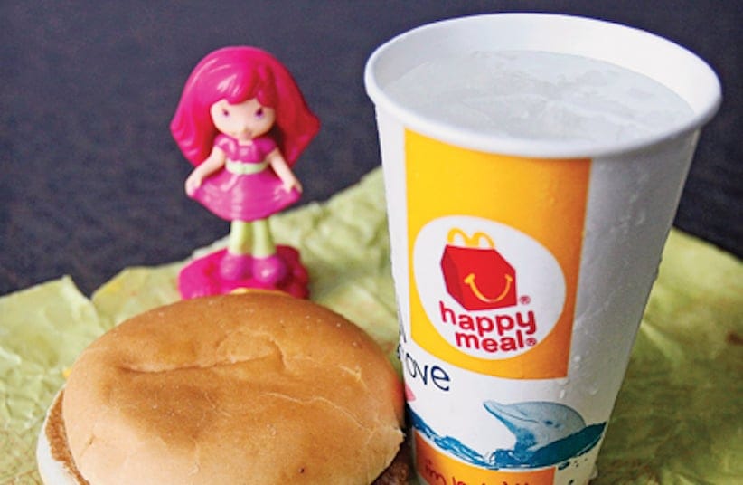 A McDonald's cheeseburger Happy Meal with the new apple slices option is shown on Tuesday, July 26, 2011, in Pittsburgh. (Keith Srakocic/AP)