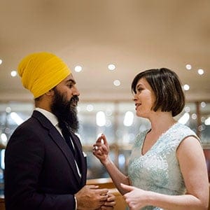 Federal NDP Leader Jagmeet Singh and Chief of Staff, Willy Blomme chat prior to having their portrait taken before the Broadbent Institute's Progress Gala in Toronto on Thursday, November 16, 2017. (Christopher Katsarov/CP)