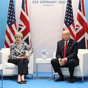 HAMBURG, GERMANY - JULY 08: British Prime Minister Theresa May meets U.S President Donald Trump during the G20 summit on July 8, 2017 in Hamburg, Germany. Leaders of the G20 group of nations are meeting for the July 7-8 summit. Topics high on the agenda for the summit include climate policy and development programs for African economies. (Photo by Matt Cardy/Getty Images)