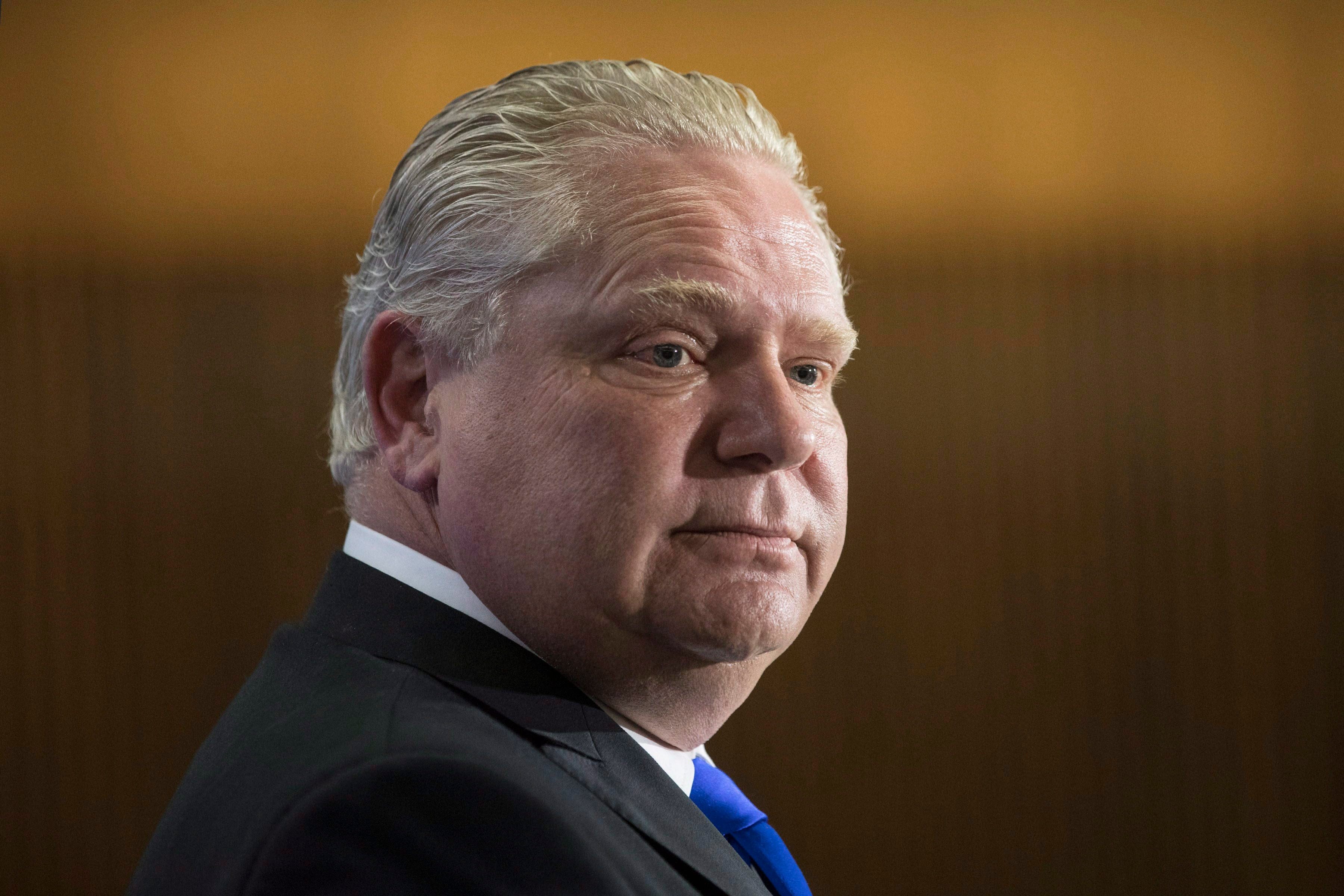Ontario PC Leader Doug Ford takes questions from journalists as the Ontario government prepares to deliver its 2018 Budget at the Queens Park Legislature in Toronto on Wednesday, March 28, 2018. (THE CANADIAN PRESS/Chris Young)