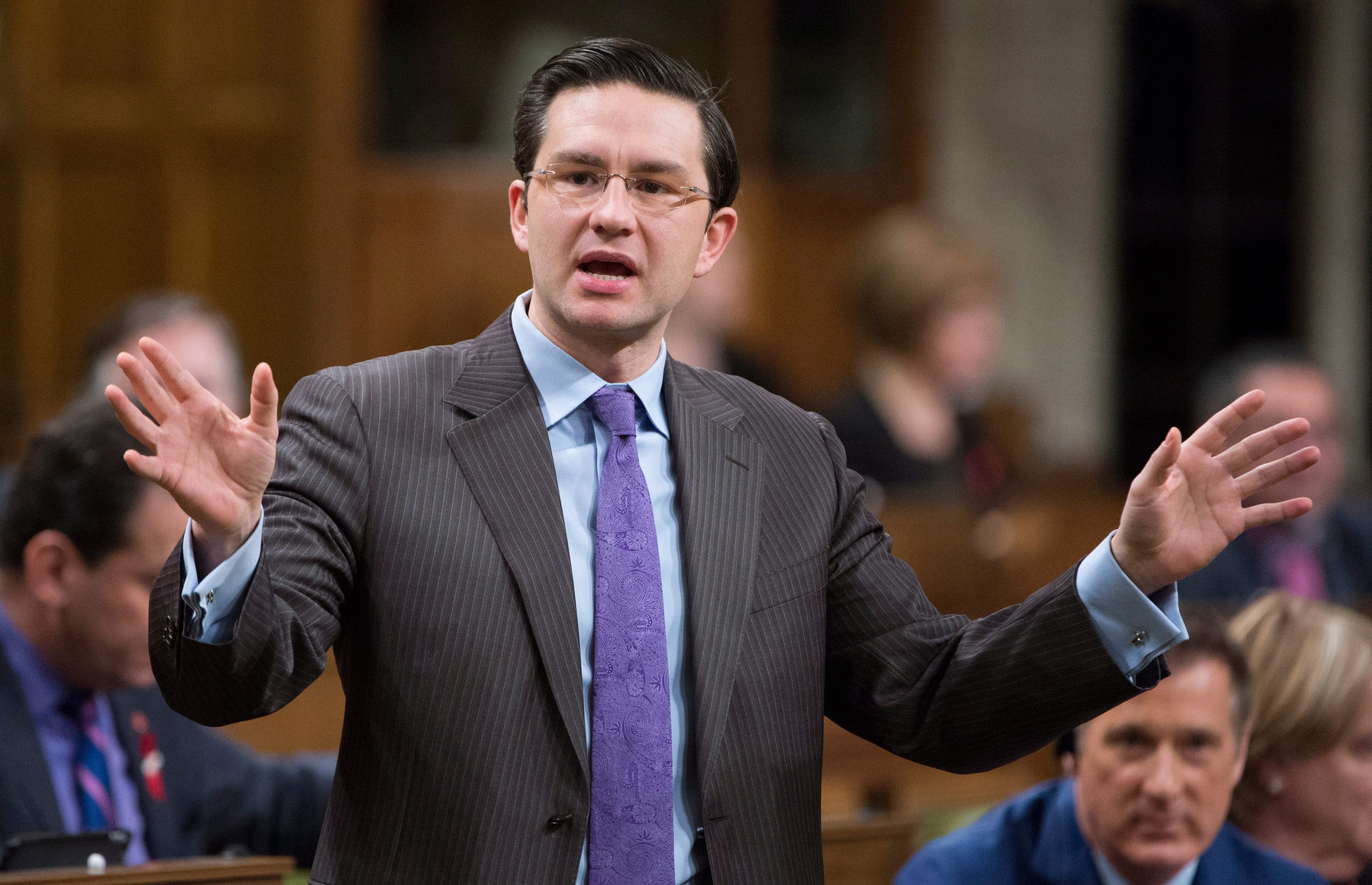 Conservative MP and finance critic Pierre Poilievre rises in the House of Commons in Ottawa on Friday, Dec. 1, 2017. (THE CANADIAN PRESS/Adrian Wyld)