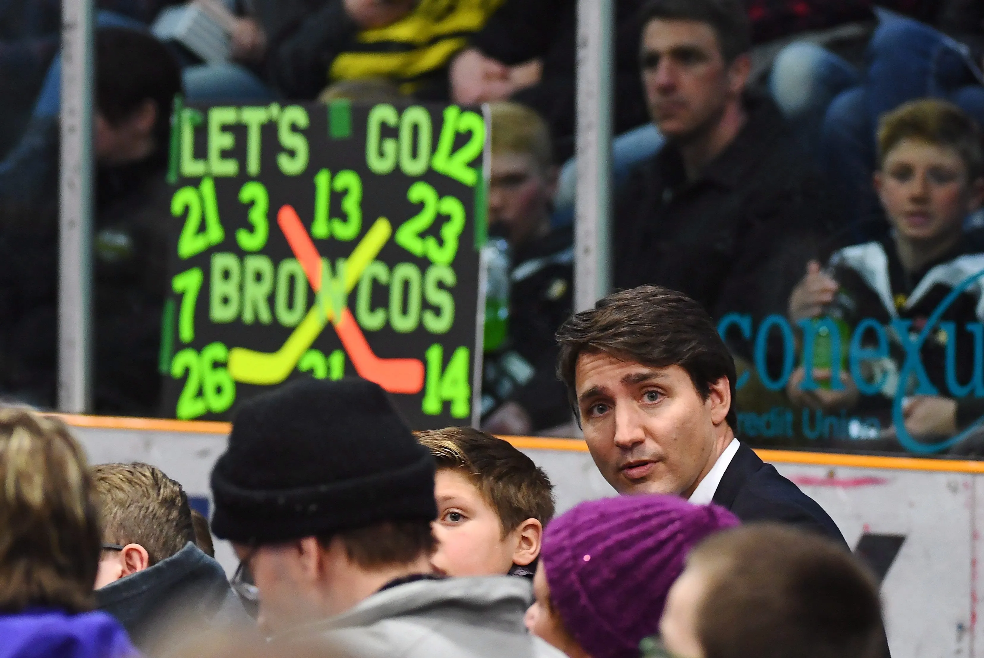 Prime Minister Justin Trudeau attends a vigil at the Elgar Petersen Arena, home of the Humboldt Broncos, to honour the victims of a fatal bus accident in Humboldt, Sask. on Sunday, April 8, 2018. (THE CANADIAN PRESS/Jonathan Hayward)