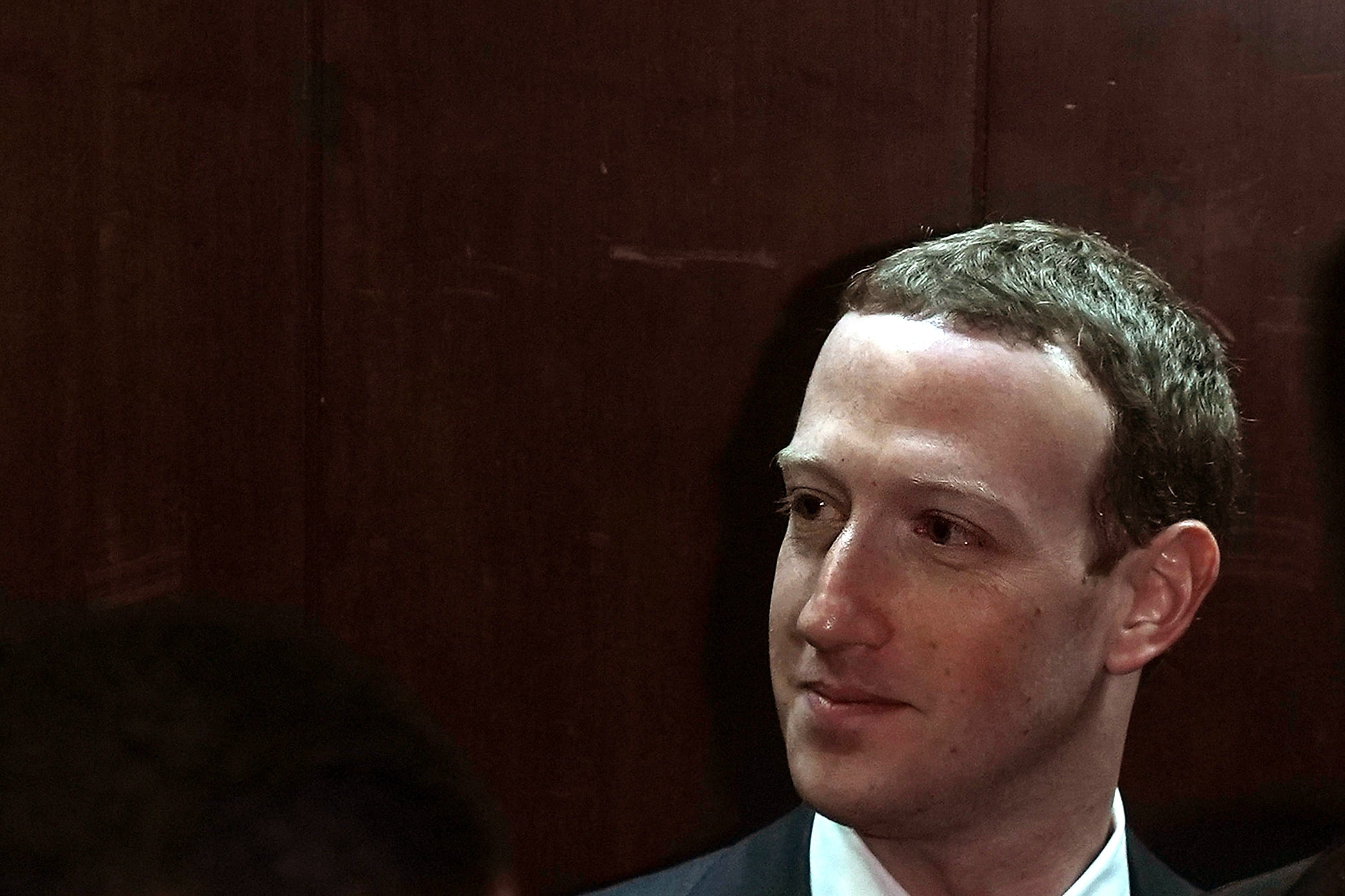 Facebook CEO Mark Zuckerberg leaves a meeting with U.S. Sen. Chuck Grassley (R-IA), chairman of Senate Judiciary Committee, April 9, 2018 on Capitol Hill in Washington. (Photo by Alex Wong/Getty Images)