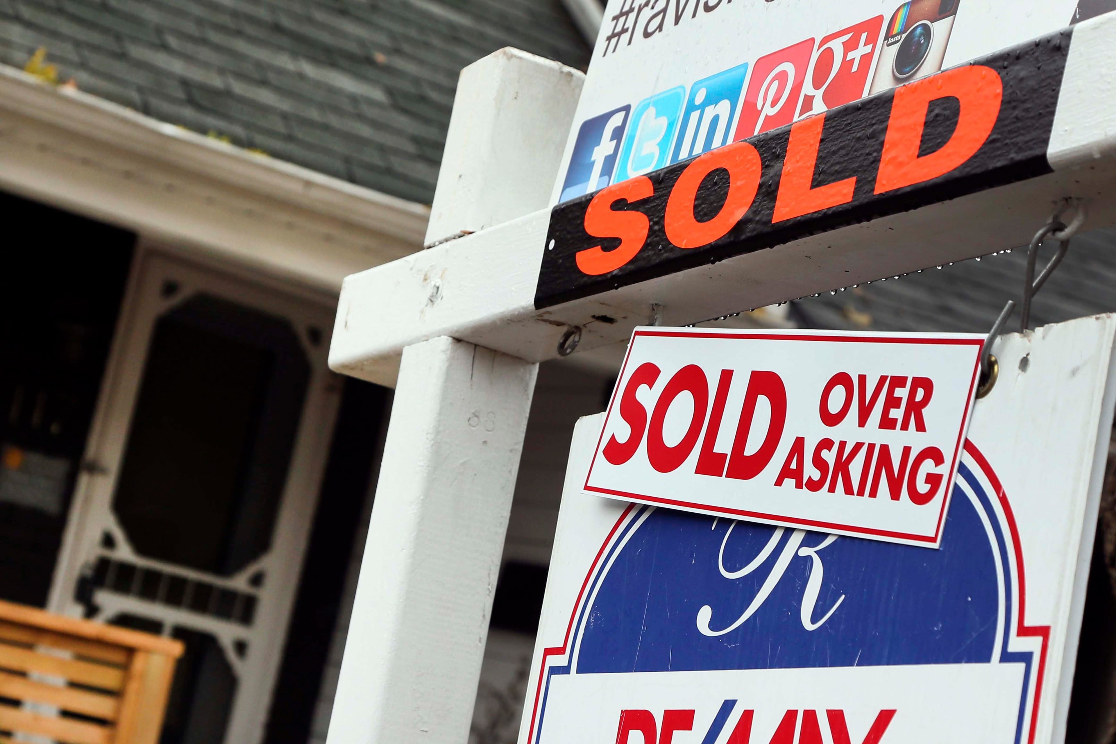 Real estate signage shot in Toronto's east end (Andrew Francis Wallace/Toronto Star/Getty Images)