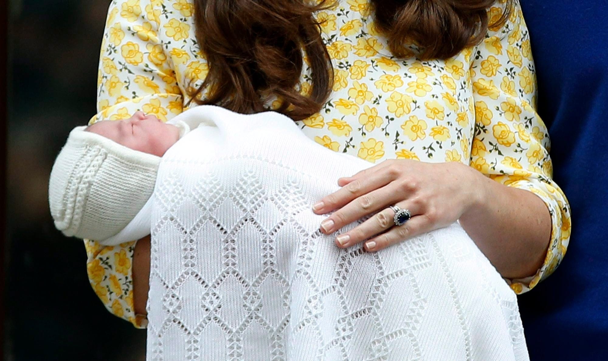 FILE - In this Saturday, May 2, 2015 file photo, Britain's Kate, Duchess of Cambridge, holding her newborn daughter, Princess Charlotte Elizabeth Diana, as she stands alongside Britain's Prince William outside St. Mary's Hospital's exclusive Lindo Wing, London. ItÄôs nearly party time for BritainÄôs Princess Charlotte, who celebrates her 2nd birthday Tuesday. (AP Photo/Alastair Grant, File)
