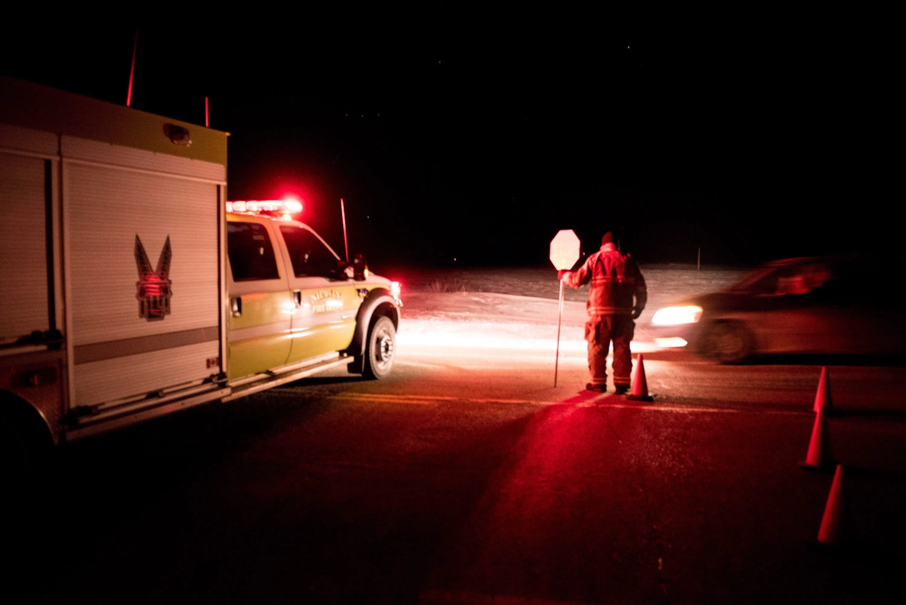 Emergency crews block the highway near the site of a bus crash near Nipawin, Sask., Friday, April 6, 2018. RCMP say people have died and others have been seriously injured in a crash between a transport truck and a bus carrying the Humboldt Broncos junior hockey team northeast of Saskatoon. THE CANADIAN PRESS/Matt Smith