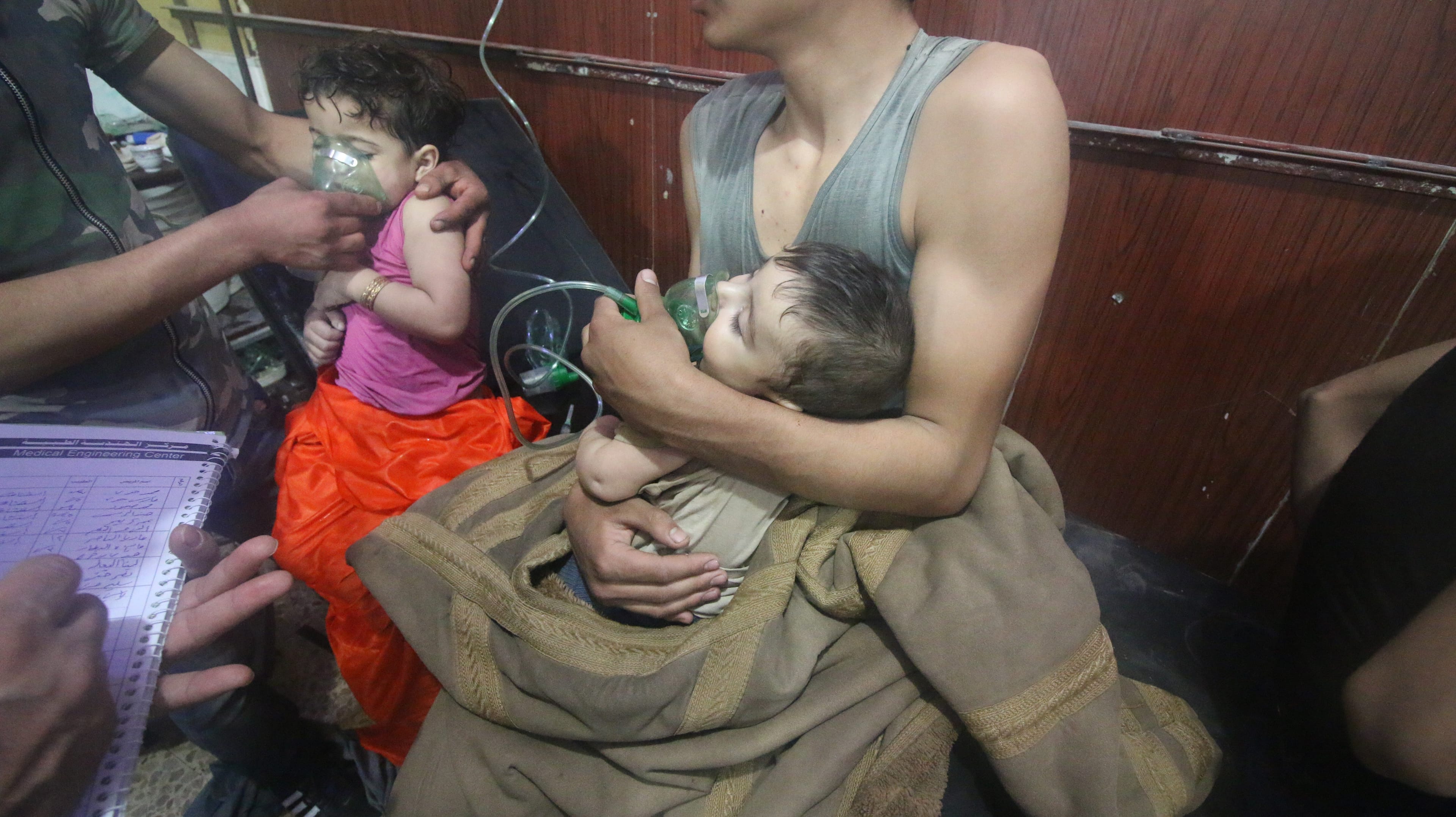 An Syrian child receives medical treatment after Assad regime forces allegedly conducted a poisonous gas attack on Douma, in Damascus, Syria on April 07, 2018. (Photo by Halil el-Abdullah/Anadolu Agency/Getty Images)