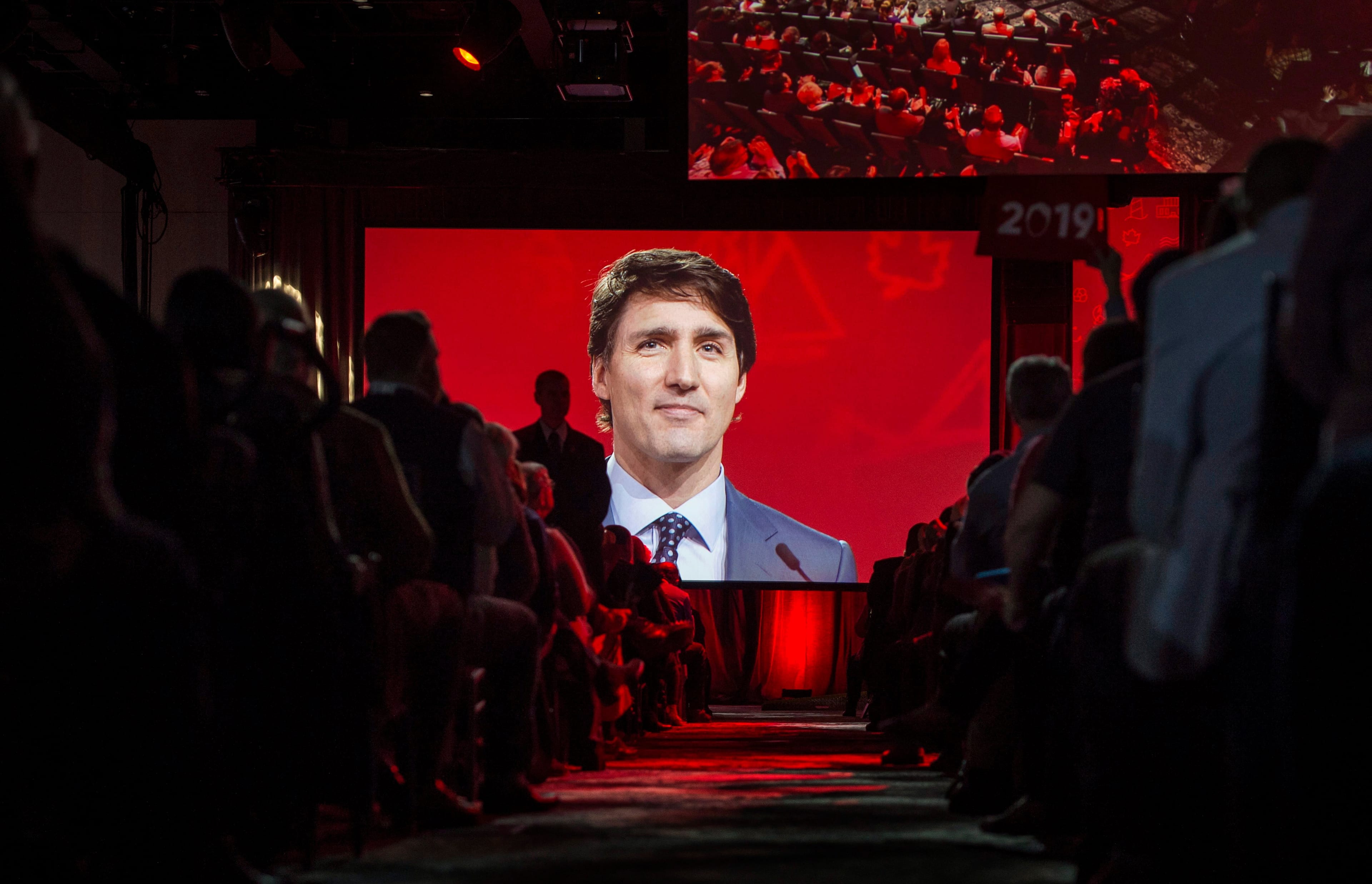 A video screen shows Prime Minister Justin Trudeau delivering a speech at the federal Liberal national convention in Halifax on Saturday, April 21, 2018. THE CANADIAN PRESS/Darren Calabrese