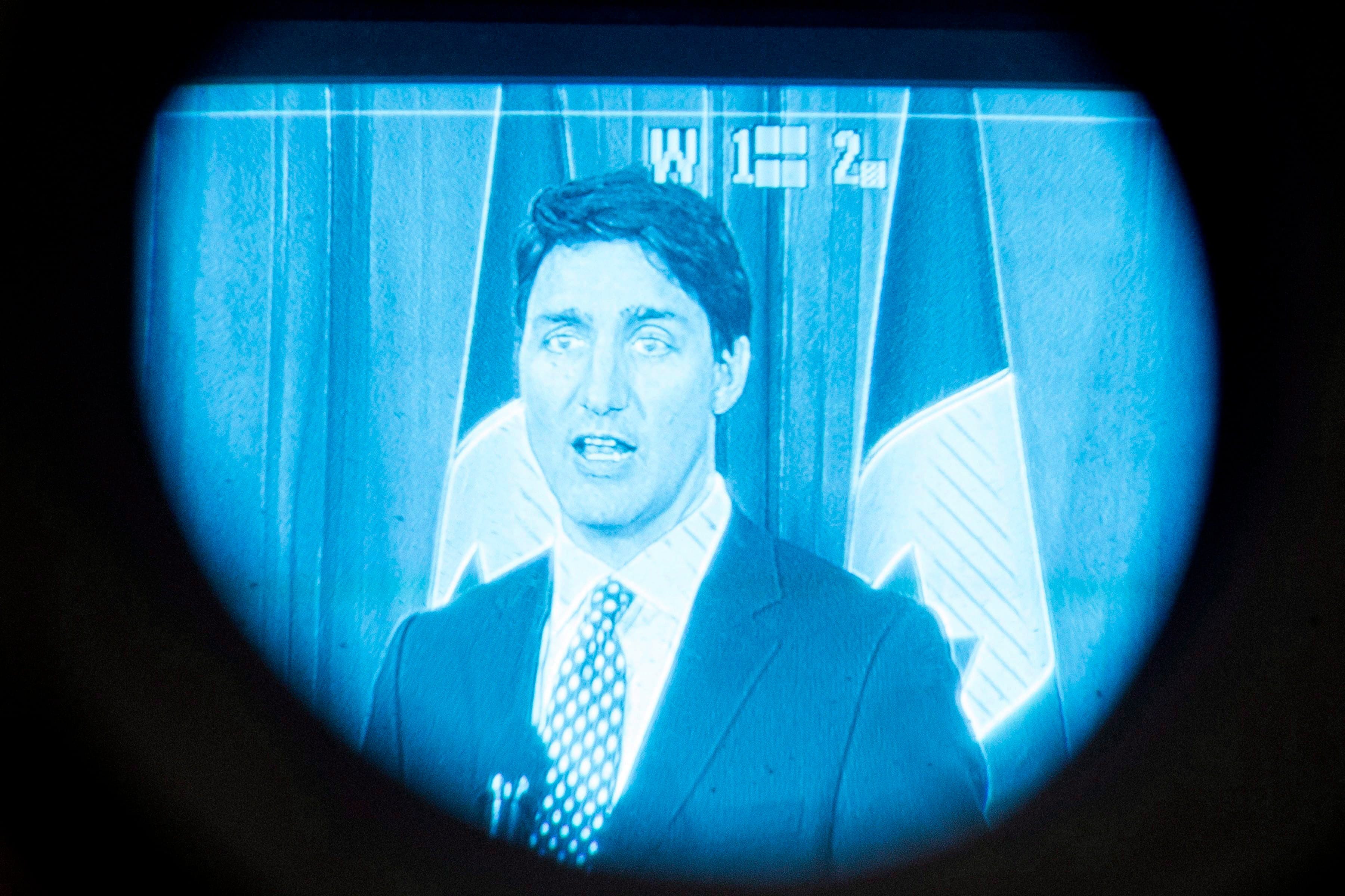 Prime Minister Justin Trudeau is seen through the eye piece of a television camera, as he takes questions from the media after addressing the UPS Conference in Toronto on Wednesday March 21, 2018. (Chris Young/CP)