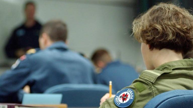 <p>PREMIUM &#8212;  A female officer cadet attends ground school before taking to skies for basic flight training. Bombardier is contracted to teach basic flight training to the Canadian Military pilot before heading off to Moose Jaw, Sask to complete basic flight training. Robert Dall/CP</p>
