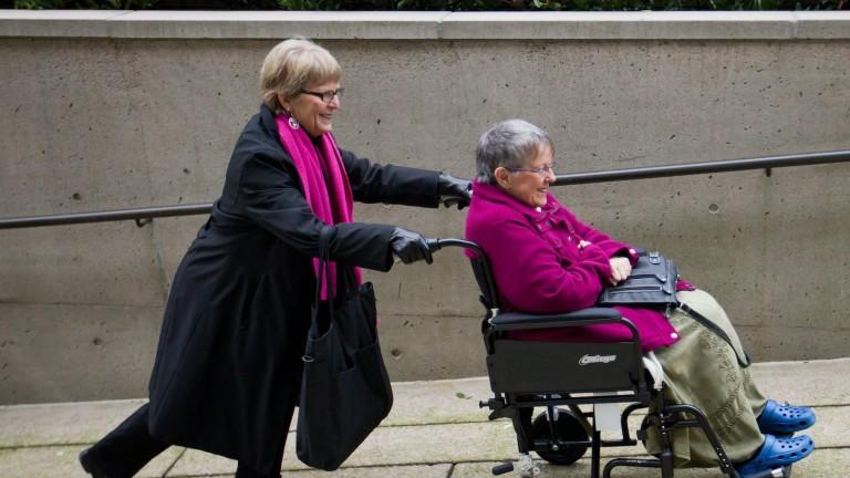 <p>Gloria Taylor, right, is assisted into British Columbia Supreme Court by fellow plaintiff Lee Carter in Vancouver, B.C., on Thursday December 1, 2011. Taylor, who has Lou Gehrig&#8217;s disease, is seeking the right to a doctor-assisted suicide in a challenge at B.C. Supreme Court. THE CANADIAN PRESS/Darryl Dyck</p>

