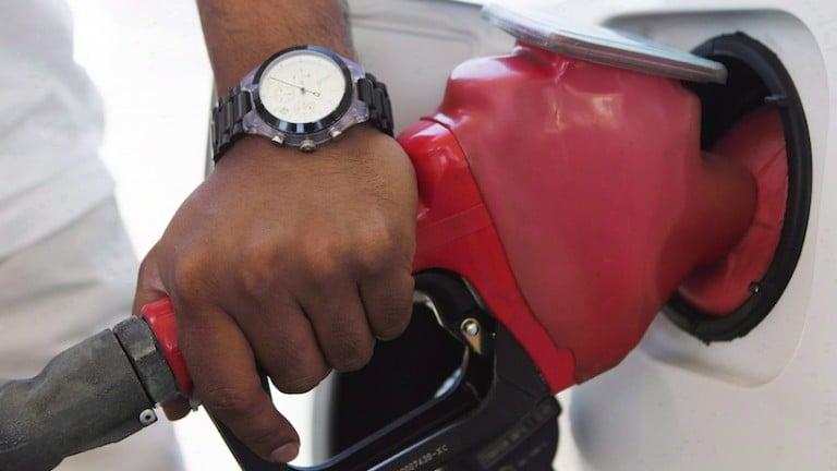 <p>Falling gas prices and a weakening loonie are raising hopes within Canada&#8217;s tourism industry that 2015 will be a banner year. Ian Jack, a spokesman for the Canadian Automobile Association, says if the current price at the pumps holds until the spring, he expects an increase in the number of people travelling by car this year. A person pumps fuel in Toronto after gasoline prices rose overnight on Wednesday, September 12, 2012. THE CANADIAN PRESS/Michelle Siu</p>
