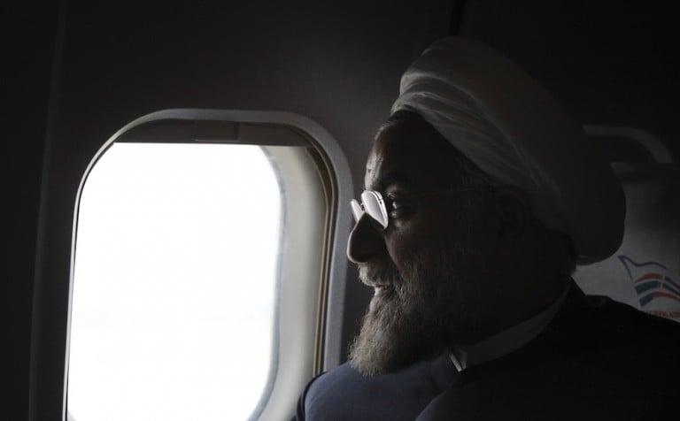 <p>FILE &#8211; In this Monday, June 10, 2013, photo, Iranian President-elect Hassan Rouhani, a former Iran&#8217;s top nuclear negotiator, looks on in his plane during his presidential election campaign tour to northwestern Iran. If, as critics contend, the nuclear framework deal between world powers and Tehran ends up projecting U.S. weakness instead, that could embolden rogue states and extremists alike, and make the region&#8217;s vast array of challenges even more impervious to Western intervention. (AP Photo/Vahid Salemi, File)</p>
